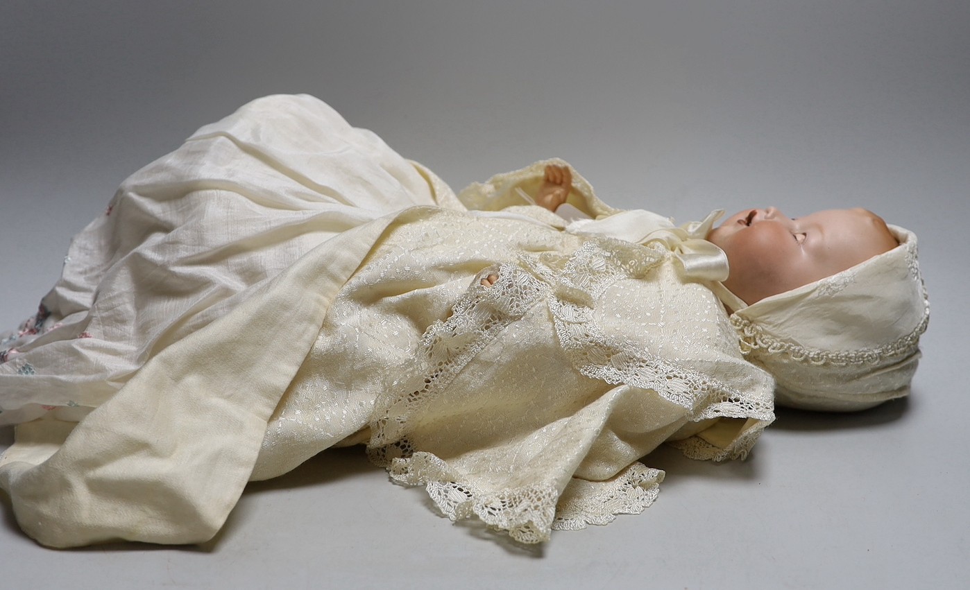 An AM open mouth bisque headed doll